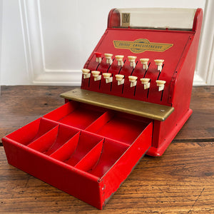 A Charming Children's French toy cash tin plate cash register. Finished in original red paintwork with white keys and a golden Caisse Enregistreuse waterslide decal. - SHOP NOW - www.intovintage.co.uk
