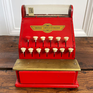 A Charming Children's French toy cash tin plate cash register. Finished in original red paintwork with white keys and a golden Caisse Enregistreuse waterslide decal. - SHOP NOW - www.intovintage.co.uk