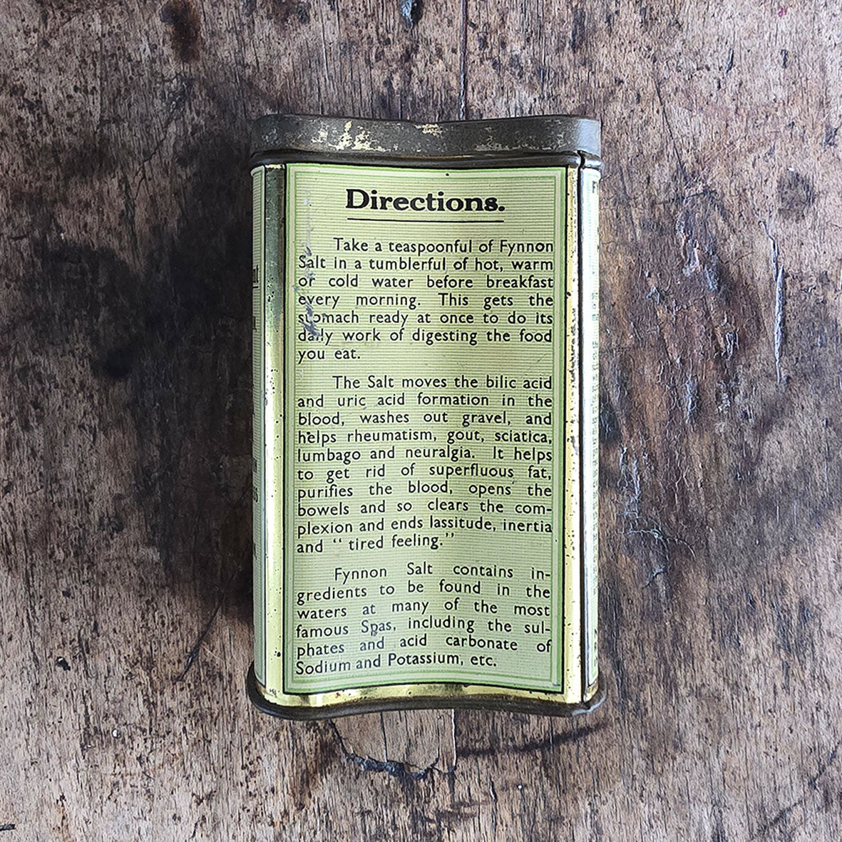 An Edwardian Fynnon Salt Tin. This tin would have held natural mineral salts, perfect for 'Over Fatness' 'Complexion' and 'Gout' amongst other remedies! Great design and typography - SHOP NOW - www.intovintage.co.uk