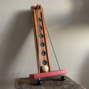 Roll up, Roll up! A Vintage table ball Game of skill. The idea of the challenge is to control the ball with the two metal rods. By parting them as the ball rolls towards you, you must try to deposit the ball in the score holes to achieve the highest score. A lot easier than it sounds!!! - SHOP NOW - www.intiovintage.co.uk