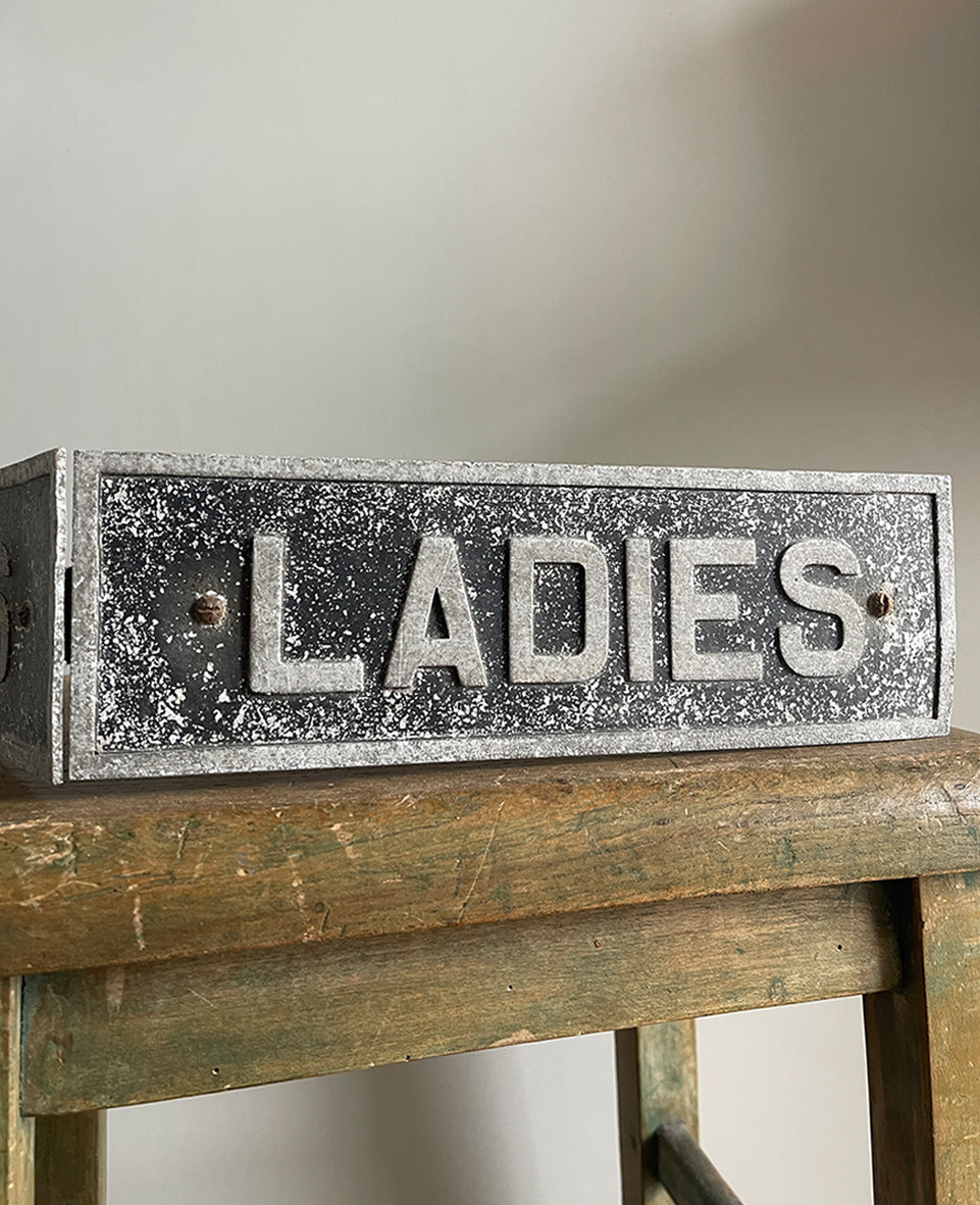 A cool Vintage Alloy Ladies & Gents Sign. Bracketed back so easy to mount on the wall. Great patina to the metal's surface - SHOP NOW - www.intovintage.co.uk