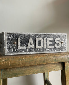 A cool Vintage Alloy Ladies & Gents Sign. Bracketed back so easy to mount on the wall. Great patina to the metal's surface - SHOP NOW - www.intovintage.co.uk