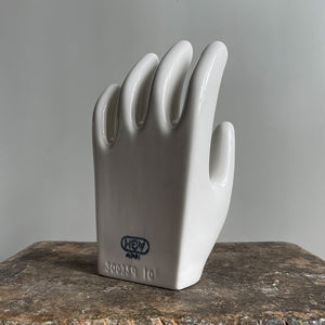 A sculptural Factory Glove Mould. Finished in a white glaze and stamped '300359 10' and 'AGH' printed in blue numerals to the front. In perfect condition - SHOP NOW - www.intovintage.co.uk