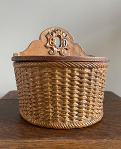 A delightful Late 19th Century Salt Box with a whicker design and hinged wooden lid. The word 'GOD' is visible on the back plate with the 'O' being the hole so that it can be mounted on the wall - SHOP NOW - www.intovintage.co.uk