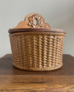 A delightful Late 19th Century Salt Box with a whicker design and hinged wooden lid. The word 'GOD' is visible on the back plate with the 'O' being the hole so that it can be mounted on the wall - SHOP NOW - www.intovintage.co.uk