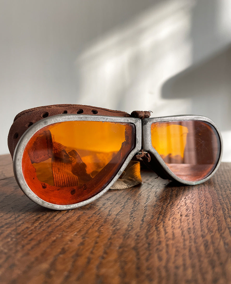 A fantastic pair of original British Army MT goggles with their original box. Amber glass lenses, leather trim and original elastic. These goggles were worn by drivers, tank crews, dispatch riders and more, throughout the Second World War - SHOP NOW - www.intovintage.co.uk