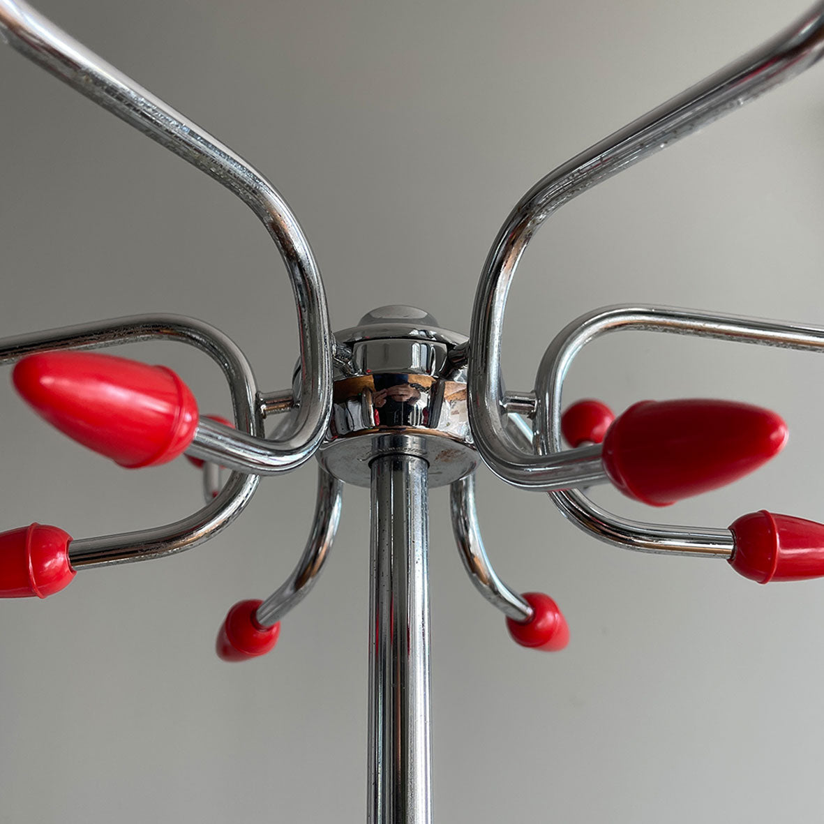 A cool looking Vintage HAGO 'Sputnik' Coat Rack from the 1960s. In a smart looking black, red and chrome colour combo. It has six main double red bobble hooks on the top section, three mini hooks on the stem, and a hoop ring for your umbrellas - SHOP NOW - www.intovintage.co.uk