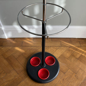 A cool looking Vintage HAGO 'Sputnik' Coat Rack from the 1960s. In a smart looking black, red and chrome colour combo. It has six main double red bobble hooks on the top section, three mini hooks on the stem, and a hoop ring for your umbrellas - SHOP NOW - www.intovintage.co.uk