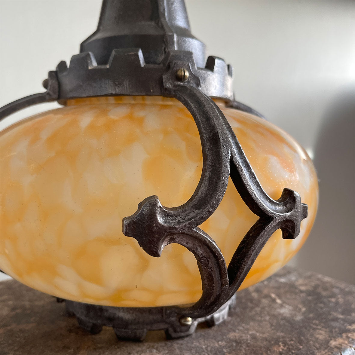 A fine looking Edwardian Porch or Hall Lamp shade. The yellow mottled hand blown glass shade is held in position by cast gothic style curved struts that are attached top & bottom to a castellated top and bottom gallery - SHOP NOW - www.intovintage.co.uk