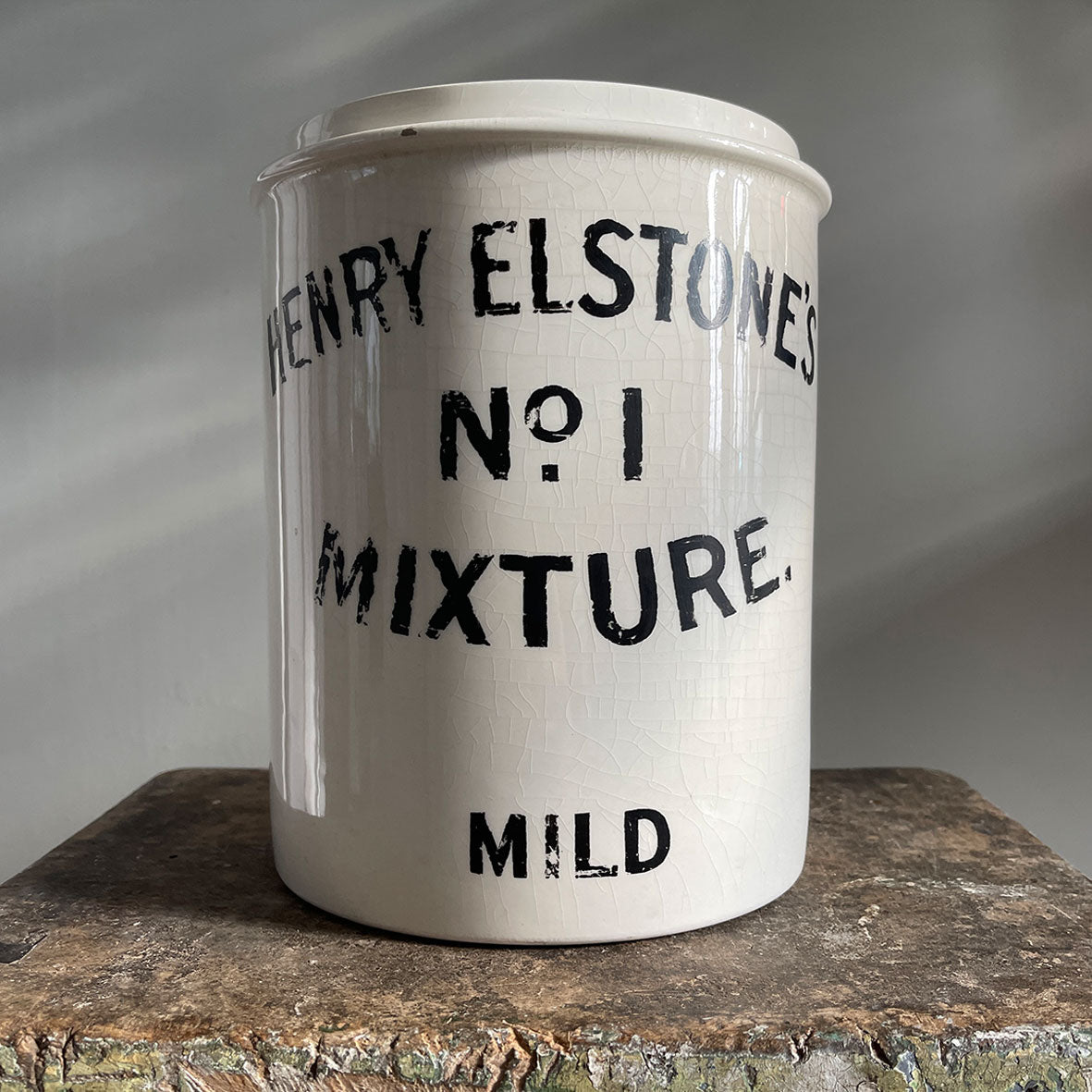 A great looking Henry Elstone's White glazed Tobacco Jar from the Edwardian Period with wonderful distressed type to the front - SHOP NOW - www.intovintage.co.uk