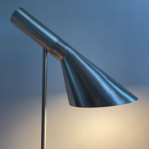 A stylish Carlo Task Lamp with contrasting brushed aluminium metal work with a grey marble base. The lamp head is adjustable and can be positioned in an up or down position - SHOP NOW - www.intovintage.co.uk