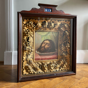 An impressive Russian Church Art Piece of John the Baptist from the Victorian period. The well executed painting is framed in a plaster gilt frame of vine leaves and grapes, this is in-turn inside a stained pine cabinet fronted in its original glass - SHOP NOW - www.intovintage.co.uk