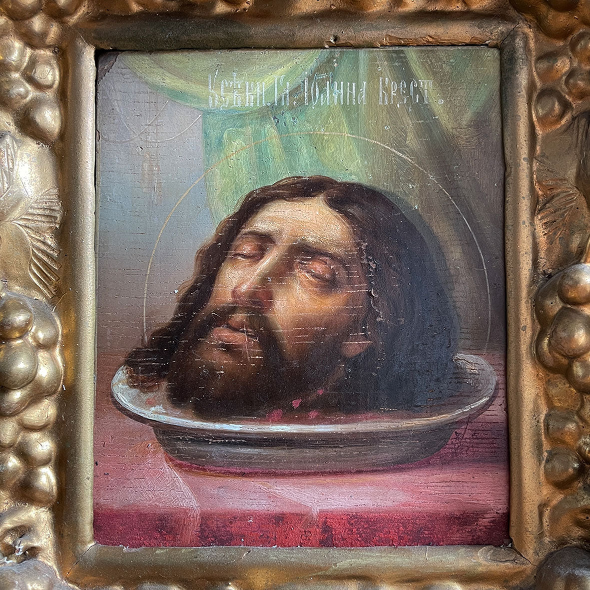An impressive Russian Church Art Piece of John the Baptist from the Victorian period. The well executed painting is framed in a plaster gilt frame of vine leaves and grapes, this is in-turn inside a stained pine cabinet fronted in its original glass - SHOP NOW - www.intovintage.co.uk