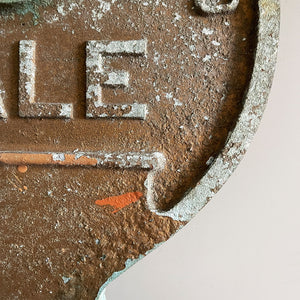 A large cast metal oversized Yale key with its original hanging chains, used as an advertisement display in locksmith shops and ironmongers. It has its original gilt paint finish that has weathered over the yeas to achieve the most amazing patinated finish. Hangs horizontal when suspended on its chains - SHOP NOW - www.intovintage.co.uk