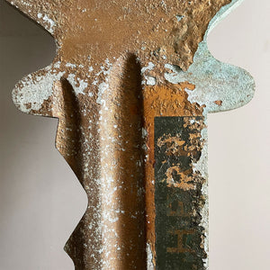 A large cast metal oversized Yale key with its original hanging chains, used as an advertisement display in locksmith shops and ironmongers. It has its original gilt paint finish that has weathered over the yeas to achieve the most amazing patinated finish. Hangs horizontal when suspended on its chains - SHOP NOW - www.intovintage.co.uk