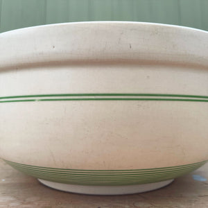 A lovely old and well loved Kleen Kitchen Ware Bowl. Smart green stripes and lots of surface wear - SHOP NOW - www.intovintage.co.uk 