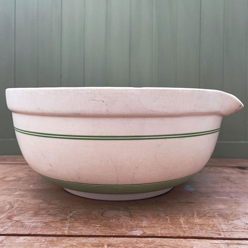 A lovely old and well loved Kleen Kitchen Ware Bowl. Smart green stripes and lots of surface wear - SHOP NOW - www.intovintage.co.uk 