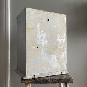 A Vintage Medical Cabinet from the 1930s with a Deco style chrome & bakelite handle to the door. The paint has been removed from the outside to leave a bare aluminium finish. The inside and shelf has its original cream finish - SHOP NOW - www.intovintage.co.uk