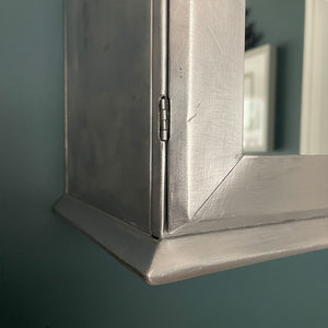 A Vintage Medical Cabinet from the 1930s with a Deco style chrome & bakelite handle to the door. The paint has been removed from the outside to leave a bare aluminium finish. The inside and shelf has its original cream finish - SHOP NOW - www.intovintage.co.uk