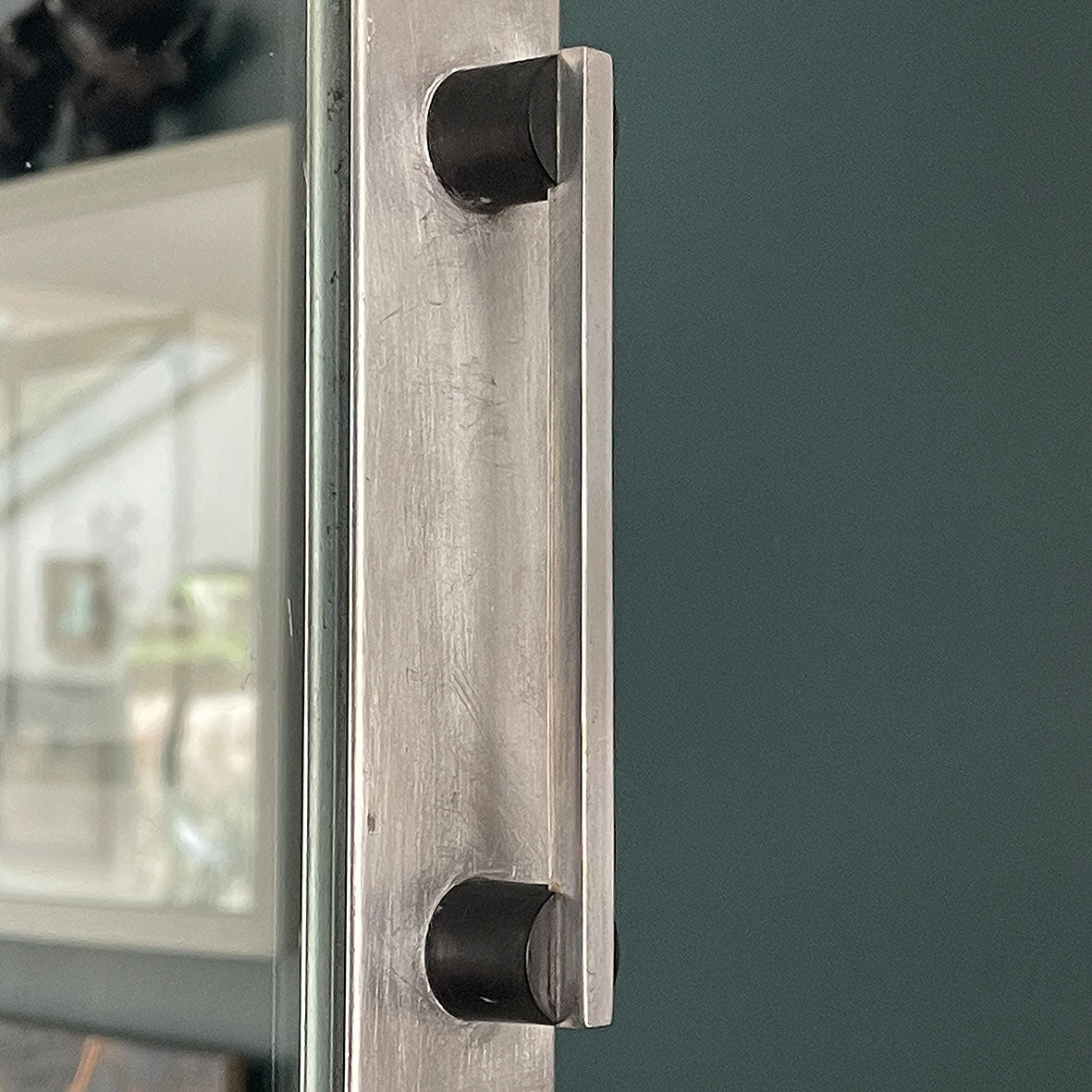 A Vintage Medical Cabinet from the 1930s with a Deco style chrome & bakelite handle to the door. The paint has been removed from the outside to leave a bare aluminium finish. The inside and shelf has its original cream finish - SHOP NOW - www.intovintage.co.uk