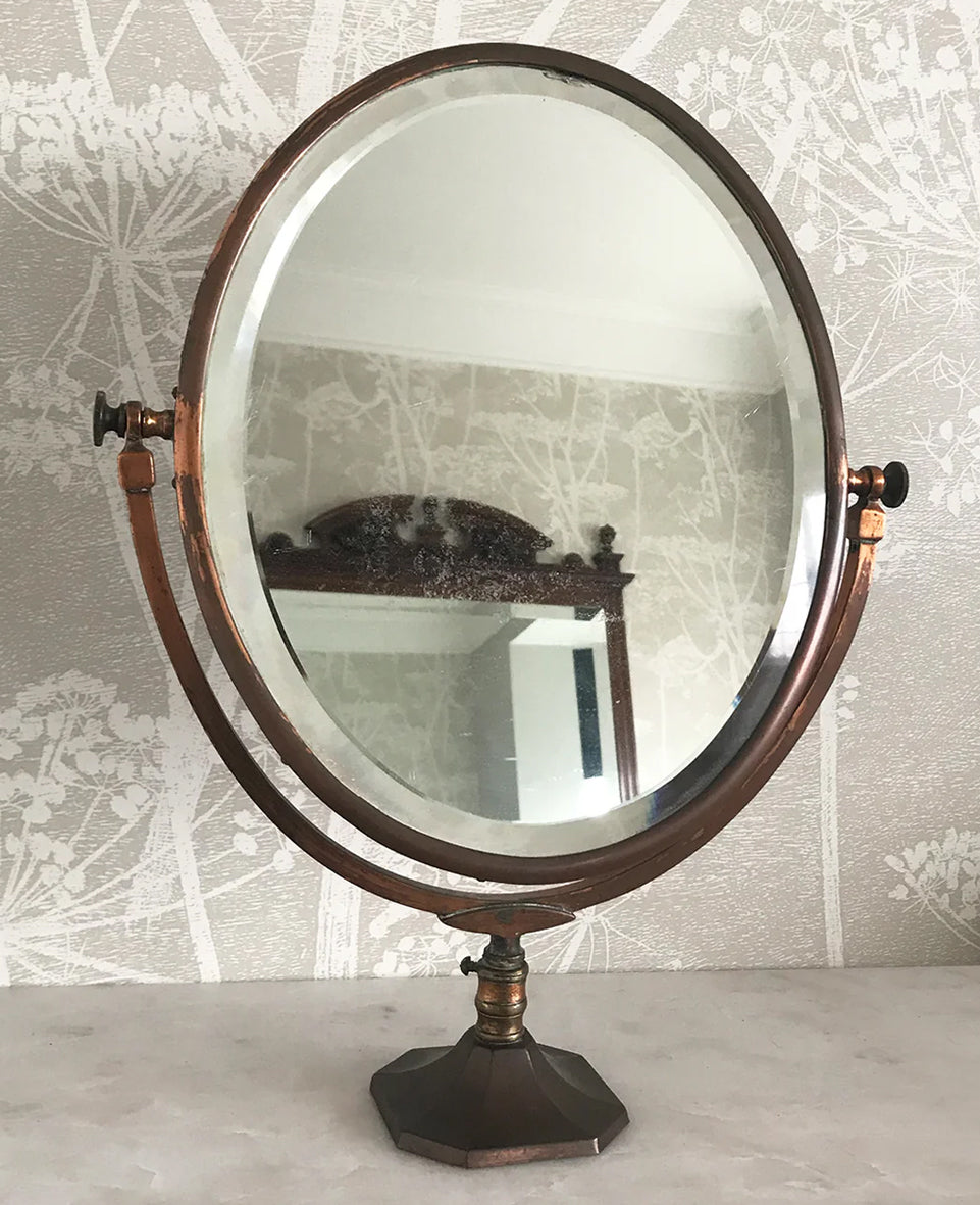 A very pretty Vintage Copper Shop Counter Mirror from an old Leigh on Sea haberdashery shop C.1930. The original mirror plate, that swivels in the frame, is bevelled and has a slight foxing on it. Great patina on the copper. Would look great in the bathroom or on the dressing table - SHOP NOW - www.intovintage.co.uk