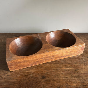 A 1930s Antique Money. Made of solid Mahogany, it has 2 deep bored bowls where money would have been kept. These trays were made to be used by shop keeps and market traders in the late 19th and early 20th century - SHOP NOW - www.intovintage.co.uk