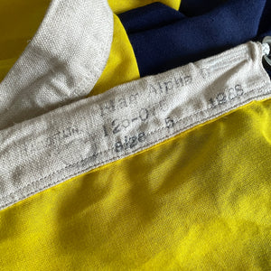 A Large Nautical Size 5 Flag. The blue and yellow stripes translate as 'G' in nautical code. The seem has two cast metal fasteners and cord, so can easily be hung. These flags look great framed and hung on the wall or, use it as a cool through or table cloth - SHOP NOW - www.intovintage.co.uk