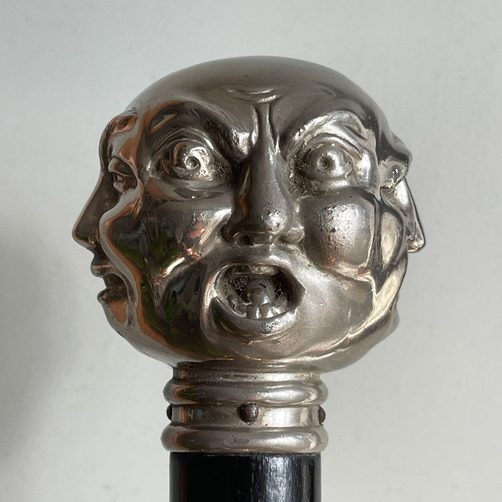 A Victorian Page Turner from around the 1870 period. A silvered head showing four characterful faces sits atop an ebonised wooden blade. The faces represent mirth, sadness, shock and anger - SHOP NOW - www.intovintage.co.uk