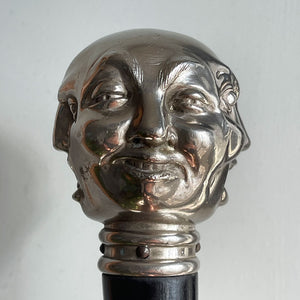 A Victorian Page Turner from around the 1870 period. A silvered head showing four characterful faces sits atop an ebonised wooden blade. The faces represent mirth, sadness, shock and anger - SHOP NOW - www.intovintage.co.uk