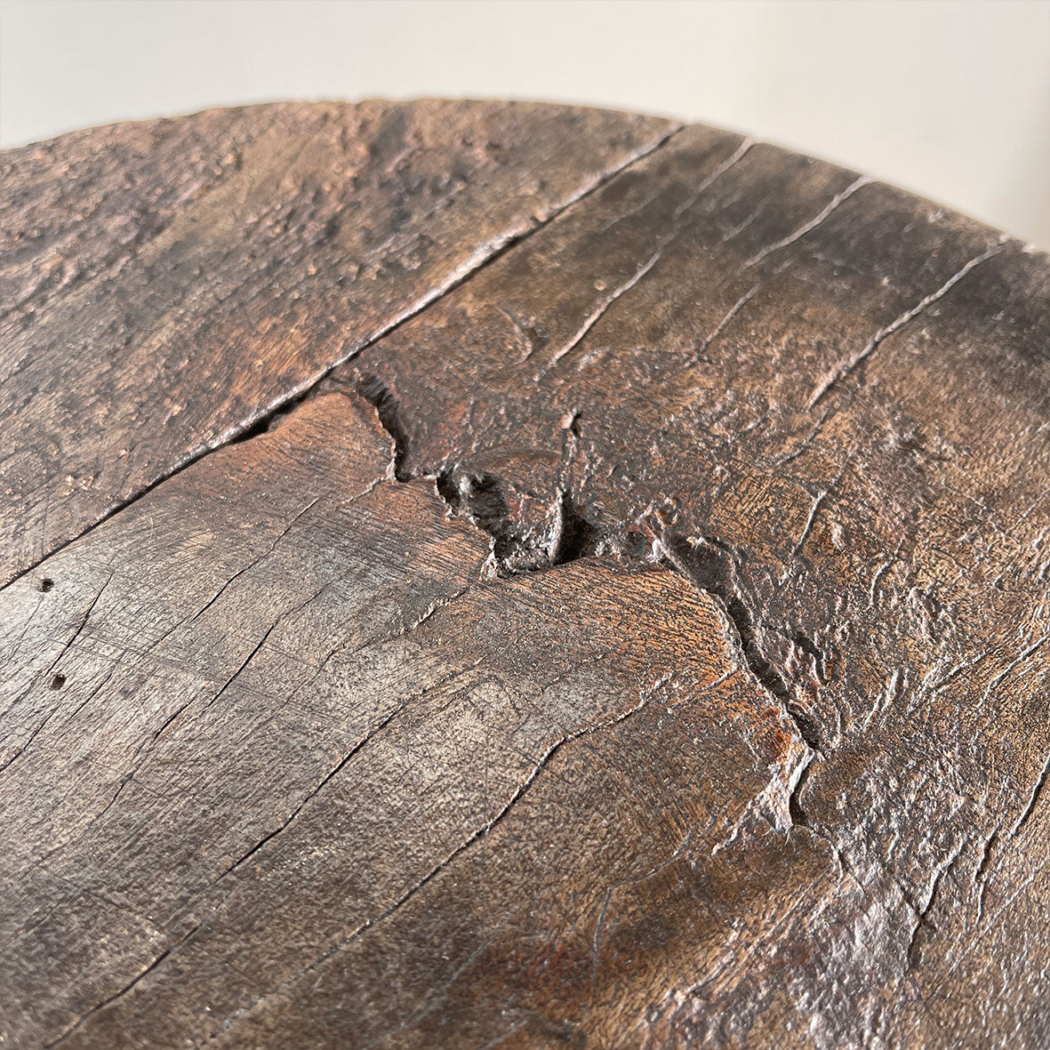 An Antique Singer Work Stool. It has a cast iron tripod base with the SINGER brand mark, a black painted steel stem and original turned wooden button seat. The wood shows fantastic age related patina. A great looking stool that would compliment any setting - SHOP NOW - www.intovintage.co.uk