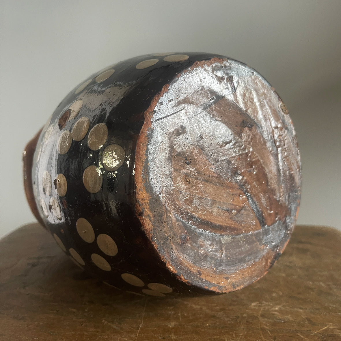An Early Spotty Earthenware Jug in a gorgeous dark chocolate brown colour with a hand applied 3 dot repeat decoration - SHOP NOW - www.intovintage.co.uk