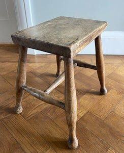 A beautiful time-worn 19th century provincial Beech stool. The rectangular beech top is raised on four turned beech supports united by a four beech stretchers - SHOP NOW - www.intovintage.co.uk