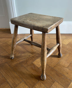 A beautiful time-worn 19th century provincial Beech stool. The rectangular beech top is raised on four turned beech supports united by a four beech stretchers - SHOP NOW - www.intovintage.co.uk