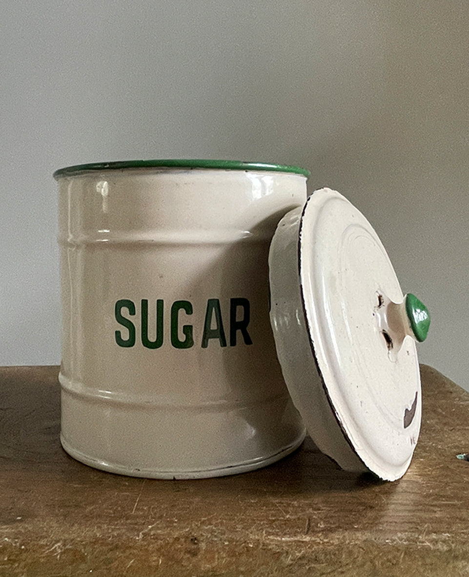 A Vintage Enamel Sugar keep with lid. Having great green typography to the front. Good looking and very usable - SHOP NOW - www.intovintage.co.uk