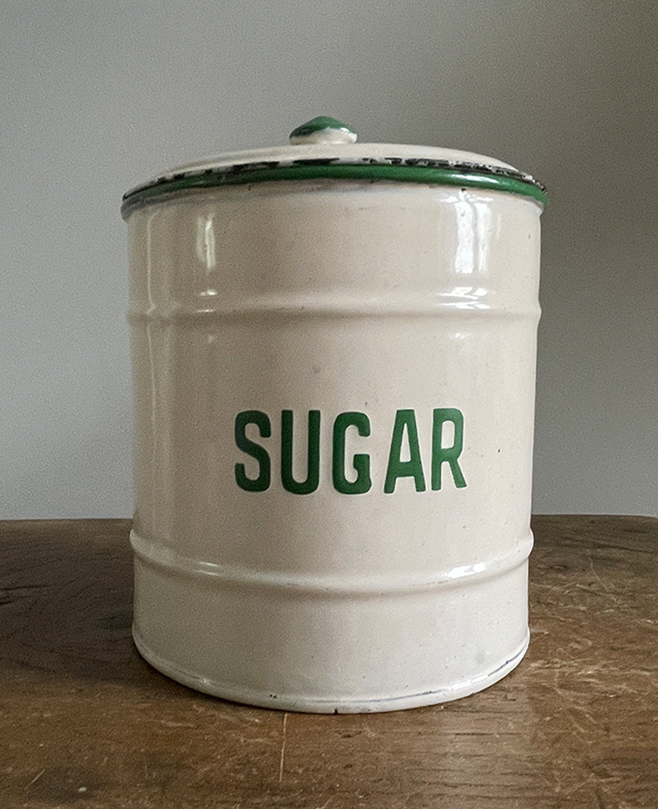 A Vintage Enamel Sugar keep with lid. Having great green typography to the front. Good looking and very usable - SHOP NOW - www.intovintage.co.uk