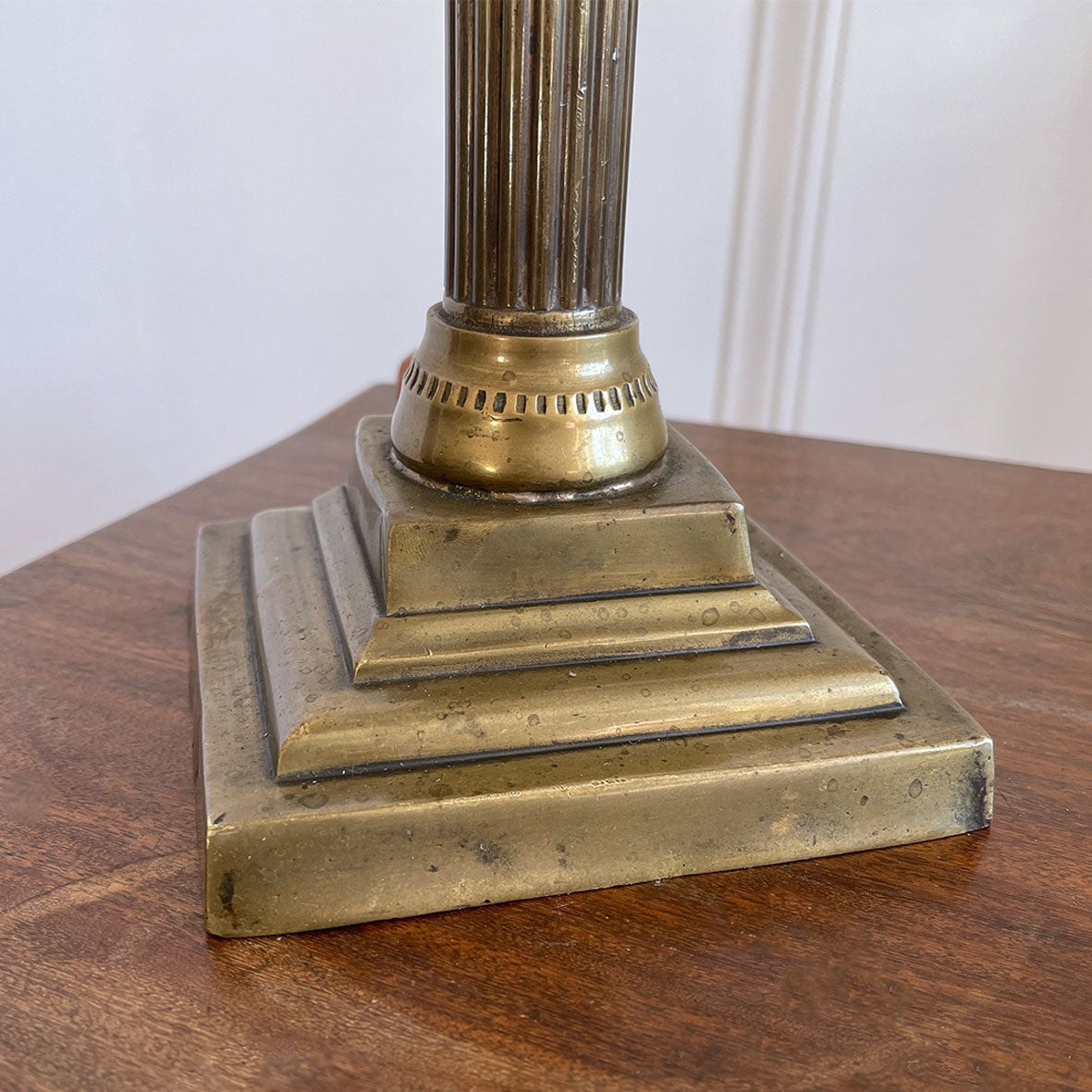 An interesting Gothic Brass Table Lamp with coat of arms to the front. The lamp sits a-top a brass fluted column base with swan neck. Wired for electricity with antique fabric covered cable, new plug and pat tested. - SHOP NOW - www.intovintage.co.uk