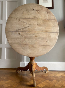 A lovely coloured Rustic French Tilt Top Table. It has a round top raised on three nicely profiled legs and central turned boss. The base still retains its original scumble painted finish. - SHOP NOW - www.intovintage.co.uk