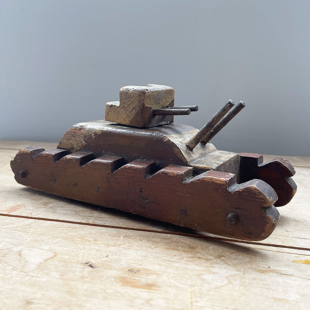 A wonderful large naive scratch built model of a WW1 tank. Lovingly made with great details and colour. It has a rotating gun turret and brass running wheels on the the underside  - SHOP NOW - www.intovintage.co.uk