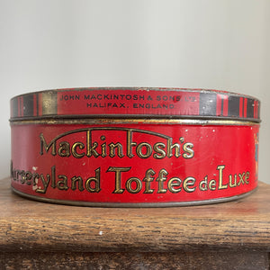 A jolly Mackintosh's Nurseryland Toffee Tin from the 1930s wonderful illustrations and colours.  - SHOP NOW - www.intovintage.co.uk