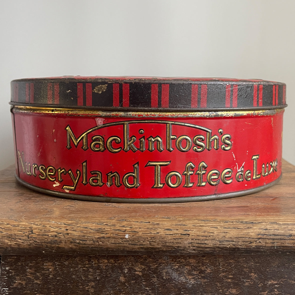 A jolly Mackintosh's Nurseryland Toffee Tin from the 1930s wonderful illustrations and colours.  - SHOP NOW - www.intovintage.co.uk