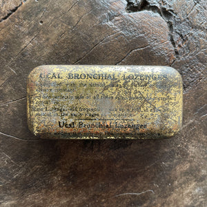 A vintage Ucal Lozenges Tin from the 1920s with a great graphic to the front. Hinged lid. - SHOP NOW - www.intovintage.co.uk