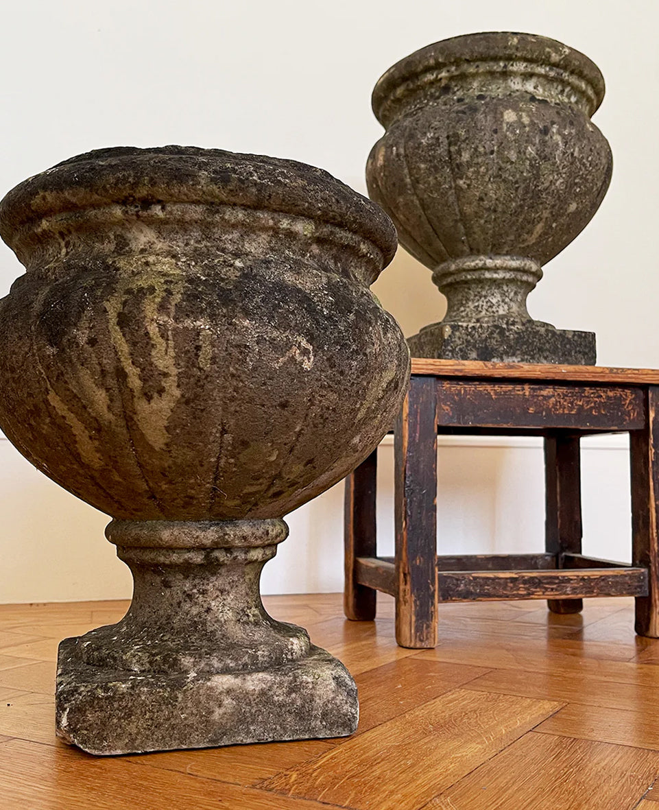 A pair of 19th century marble garden urns of classical form with a good covering of lichen. Crafted with classic proportions and shape. Both have& drainage holes. These can be used in the garden or as planters. Equally as decorative in an interior setting. Dating to c.1880 - SHOP NOW - www.intovintage.co.uk