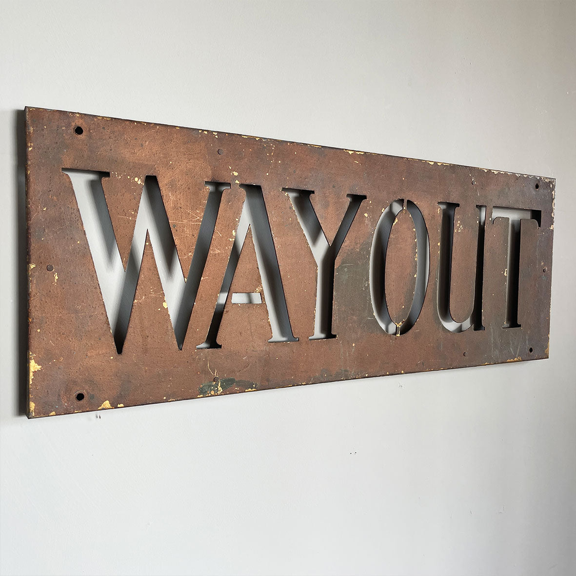 An Original Way Out Sign. Pierced letters through steel with an excellent patina to the painted finish. The sign would originally had glass fitted behind and illuminated. Good size!  SHOP NOW - www.intovintage.co.uk