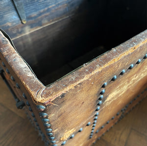 A stunning leather clad and brass studded Wine Chest with a great aged look, wear and colour. It has a hinged and barrel top with sturdy brass handle on each side. Inside sees an inner metal bin with handy handles making it easy to remove. Will hold 12 bottles of wine - SHOP NOW - www.intovintage.co.uk