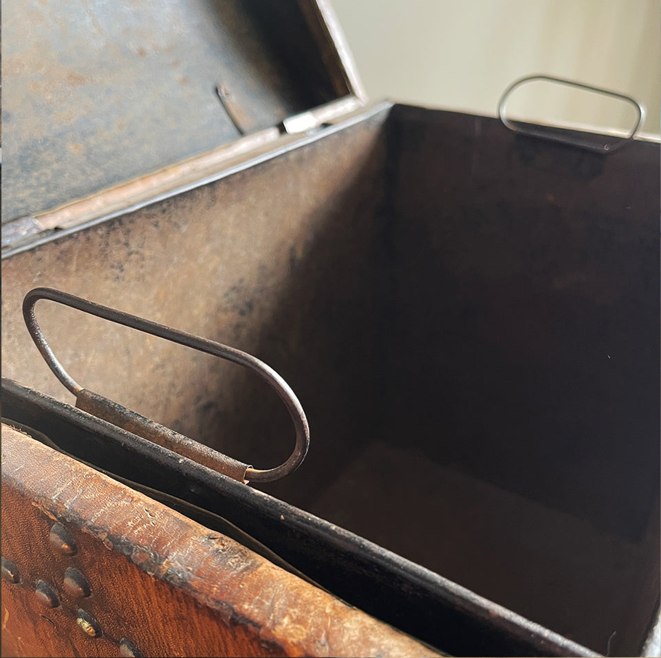 A stunning leather clad and brass studded Wine Chest with a great aged look, wear and colour. It has a hinged and barrel top with sturdy brass handle on each side. Inside sees an inner metal bin with handy handles making it easy to remove. Will hold 12 bottles of wine - SHOP NOW - www.intovintage.co.uk