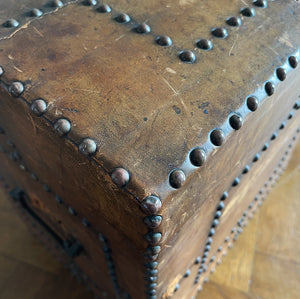 A stunning leather clad and brass studded Wine Chest with a great aged look, wear and colour. It has a hinged and barrel top with sturdy brass handle on each side. Inside sees an inner metal bin with handy handles making it easy to remove. Will hold 12 bottles of wine - SHOP NOW - www.intovintage.co.uk