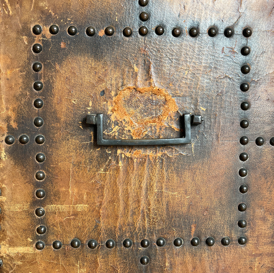 A stunning leather clad and brass studded Wine Chest with a great aged look, wear and colour. It has a hinged and barrel top with sturdy brass handle on each side. Inside sees an inner metal bin with handy handles making it easy to remove. Will hold 12 bottles of wine - SHOP NOW - www.intovintage.co.uk