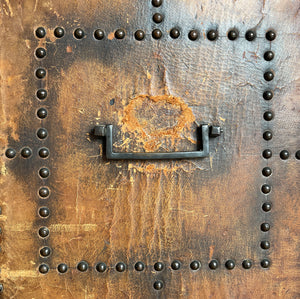 A stunning leather clad and brass studded Wine Chest with a great aged look, wear and colour. It has a hinged and barrel top with sturdy brass handle on each side. Inside sees an inner metal bin with handy handles making it easy to remove. Will hold 12 bottles of wine - SHOP NOW - www.intovintage.co.uk
