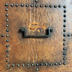 A stunning leather clad and brass studded Wine Chest with a great aged look, wear and colour. It has a hinged and barrel top with sturdy brass handle on each side. Inside sees an inner metal bin with handy handles making it easy to remove. Will hold 12 bottles of wine - SHOP NOW - www.intovintage.co.uk