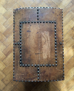 A stunning leather clad and brass studded Wine Chest with a great aged look, wear and colour. It has a hinged and barrel top with sturdy brass handle on each side. Inside sees an inner metal bin with handy handles making it easy to remove. Will hold 12 bottles of wine - SHOP NOW - www.intovintage.co.uk